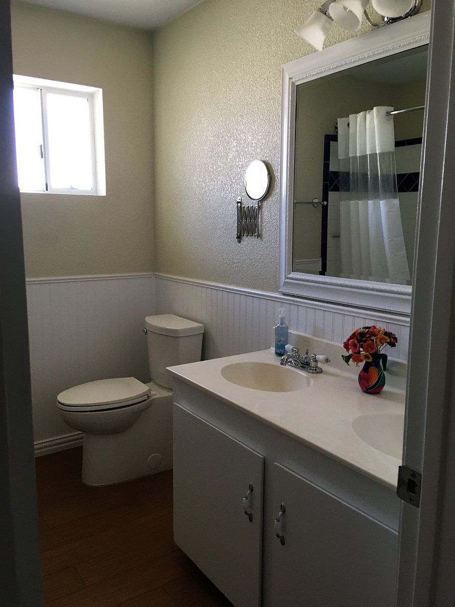 Two sinks in the larger bathroom.