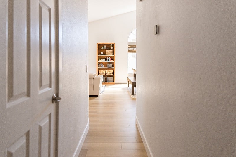 Hallway leads to the front room and dining/pool table
