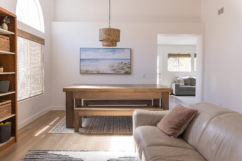 Large dining table to enjoy meal time with family.  This table doubles as a pool table.  Have fun!