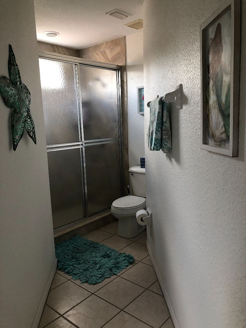 Master Bath -- toilet and shower