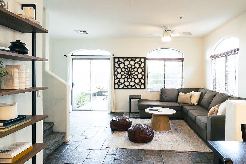 Spacious living room that flows from kitchen to patio where you can enjoy an afternoon beverage