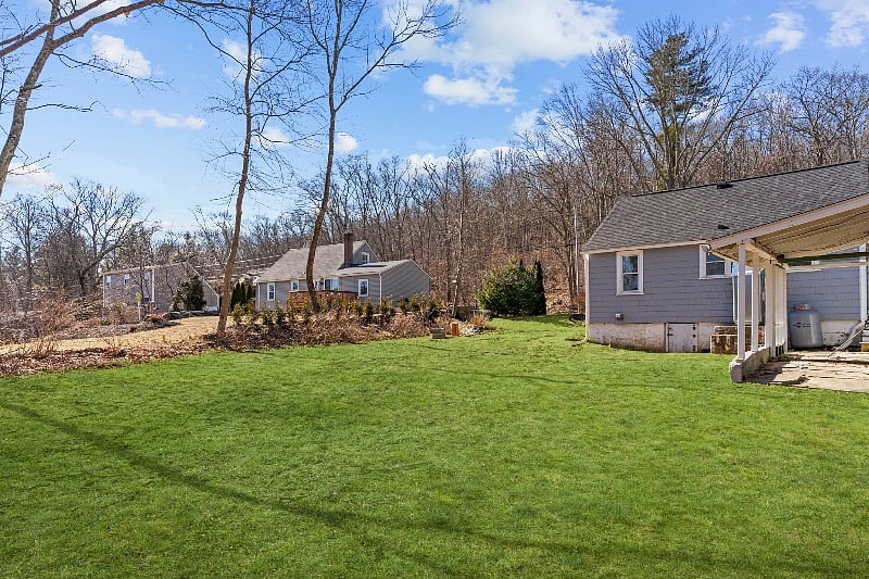 Back of home with private yard 
