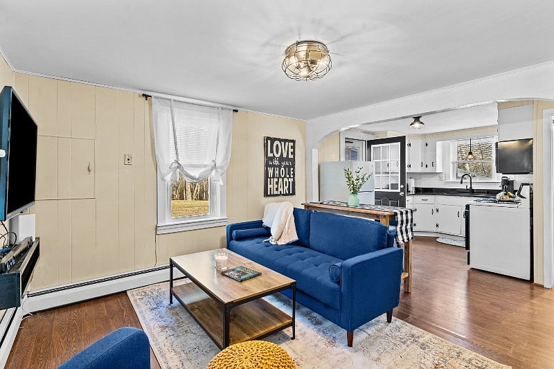 Living room and open access to dining and kitchen