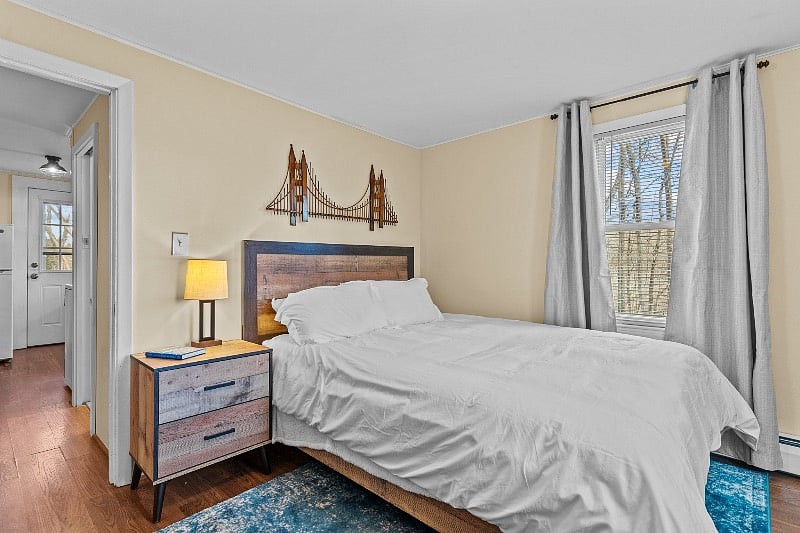 bedroom 2- queen bed brand new mattress, linens provided, black out curtains, dresser, night stand and personal smart tv