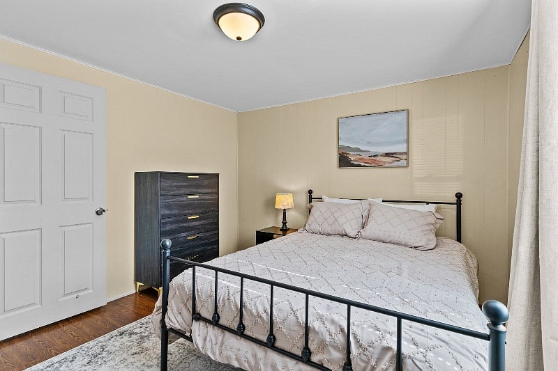 Bedroom 1- queen bed brand new mattress, linens provided, black out curtains, dresser, night stand and personal smart tv