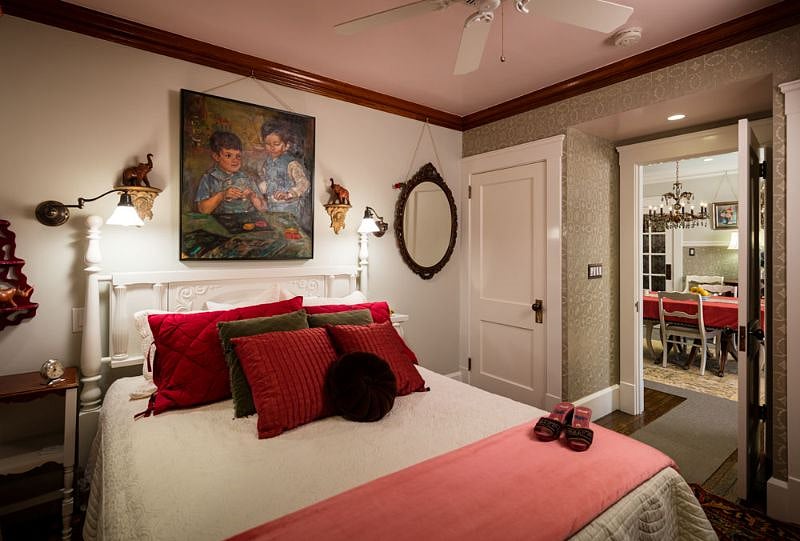 Primary Bedroom - Queen size luxury mattress, 100% cotton linens, swing-arm, dimmable wall sconces at bedside, double Closets provide plenty of storage, ceiling fan, Pella windows, custom window treatments, room darkening shades, beautiful antique dresser, 43" HD Smart TV with cable, hardwood floors and oriental rug, original oil painting.