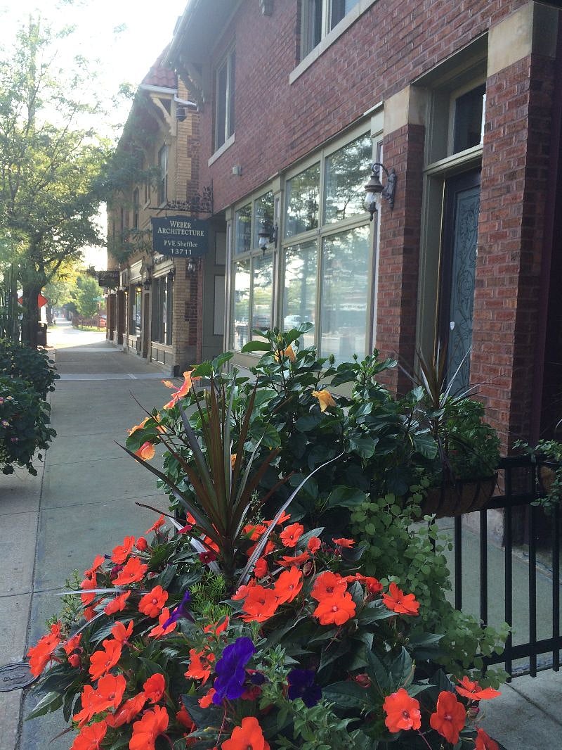 Front of "Marie Building" on Madison Avenue.  Containers are planted every season. 