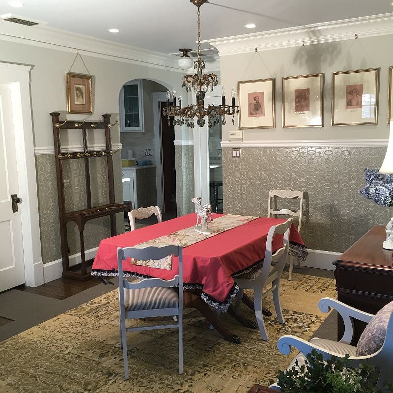 Dining Room - Dining table convenient to Kitchen.  Professionally decorated. Custom painted Lincrusta wainscotting, Hans Holbein prints custom framed, Coat Closet, Hall Stand, hardwood floors, FLOR carpet, antique (restored) chandelier with smoked crystals. LED dimmable lighting replicates daylight.