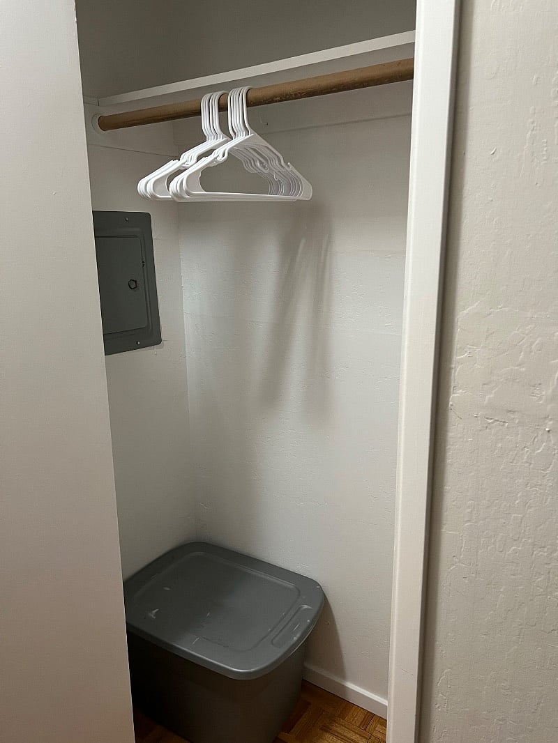 Coat closet located in hallway