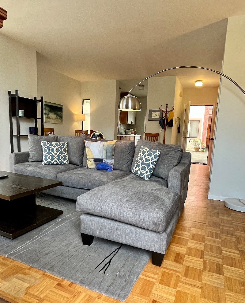 Living Rm Sofa, entry door in background
