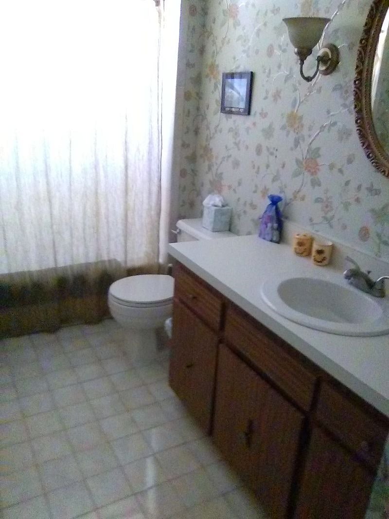 Your bathroom with tub and shower 