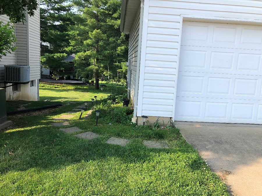Your driveway space and beginning of path to private entrance.
