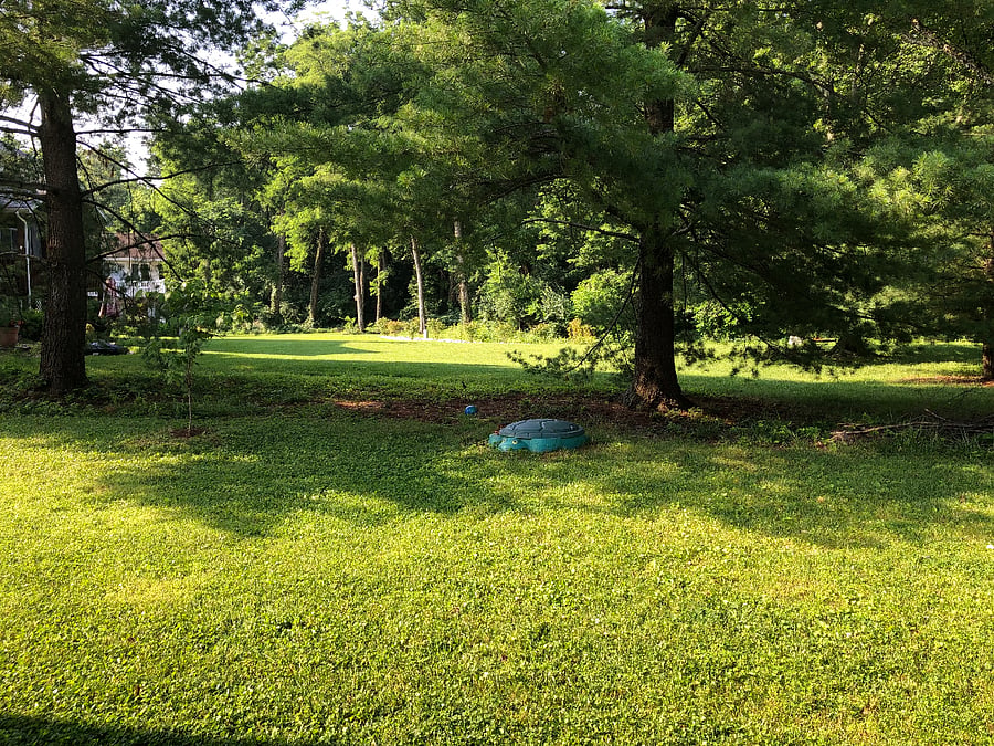 Backyard and view beyond. Sandbox for the kids!