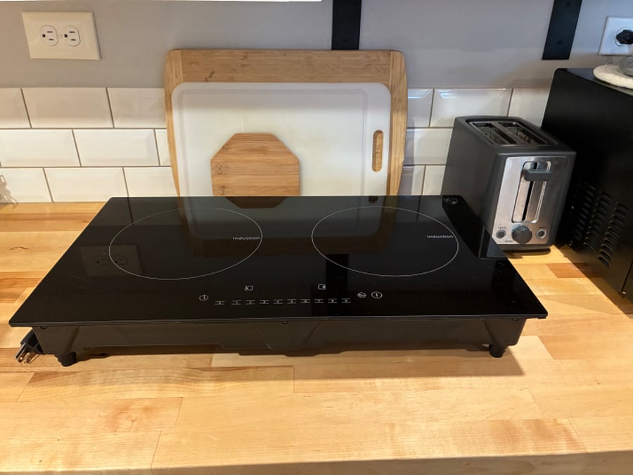 The stove top takes up a lot of counter space but it's easy to move out the way and store on the provided shelf.