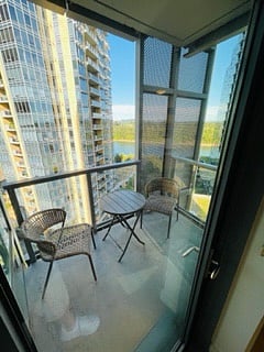 Covered balcony patio overlooks the river and has beautiful morning sunrise views