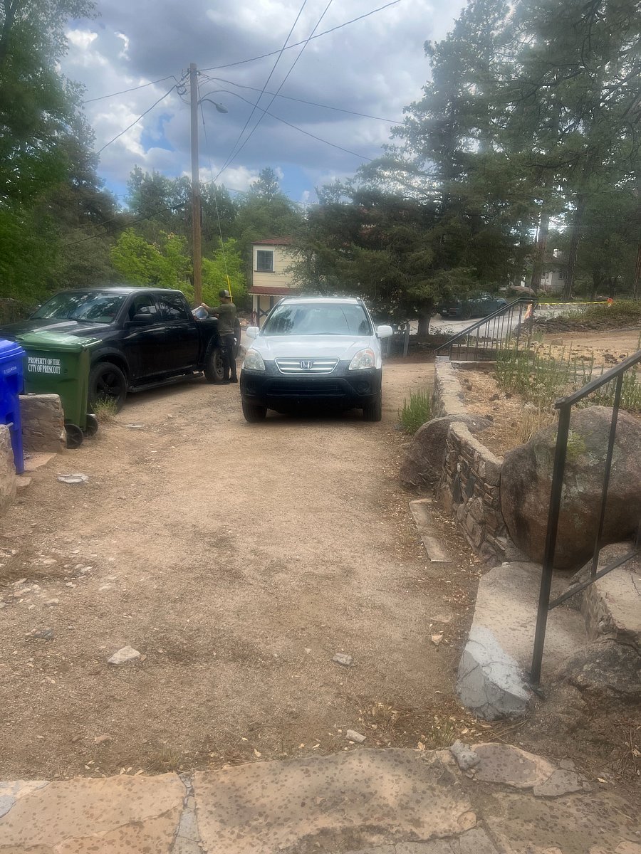 More of where one can store vehicles in front of the side parking up to the flagstone.