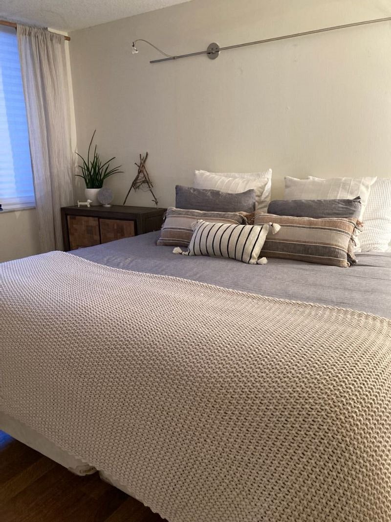 Bedroom 2 is downstairs -- king bed and a boho minimalist approach to the design makes this space peaceful and relaxing!