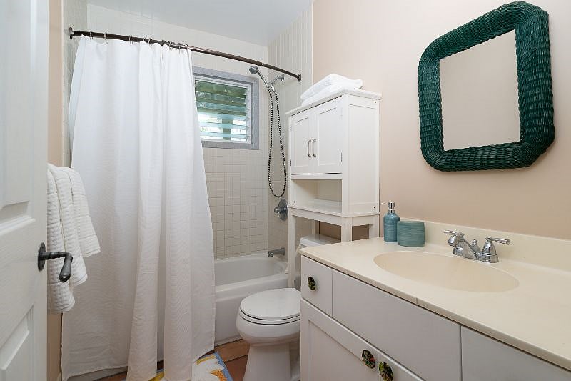 Bathroom with tub/shower combo. 