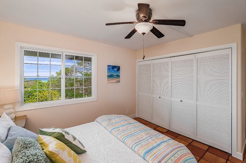 bedroom with closet doors shut