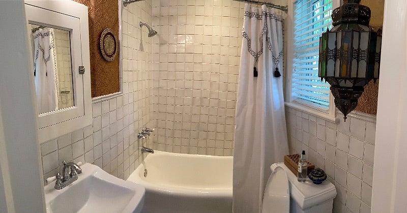 Full bath with shower and bathtub and exhaust fan