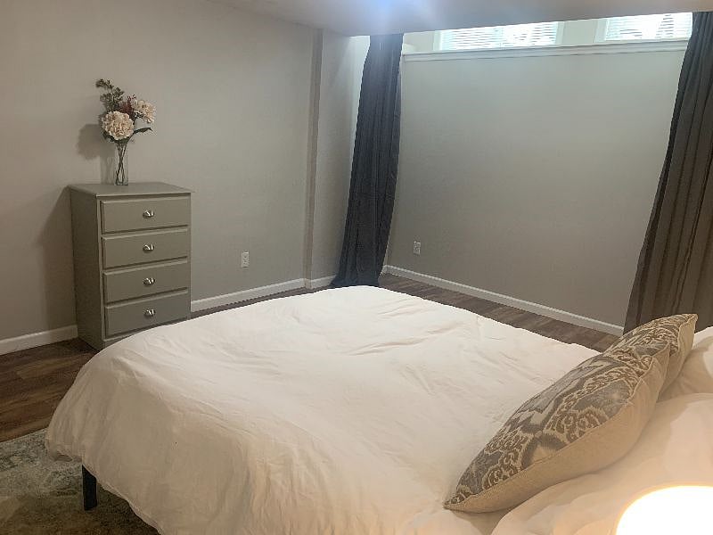 The bedroom receives lots of natural light, which can be blocked out with included black-out curtains.