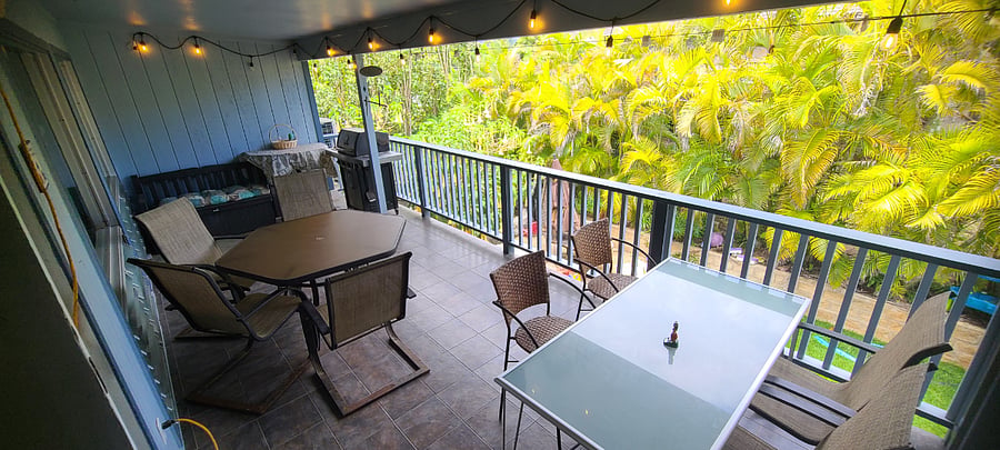 Covered Patio Area with mountain and pond views.