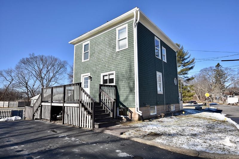 Side of home with large porch