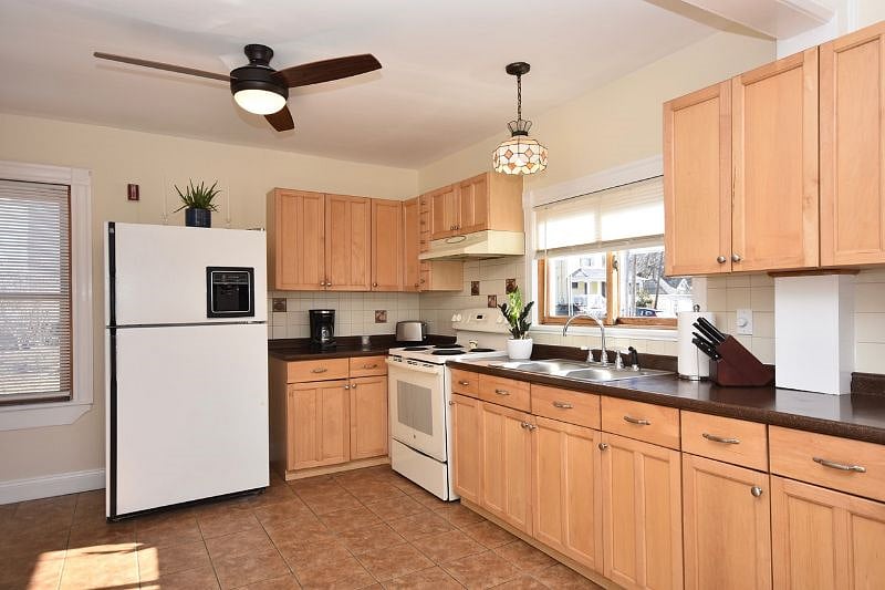 Kitchen with large refrigerator