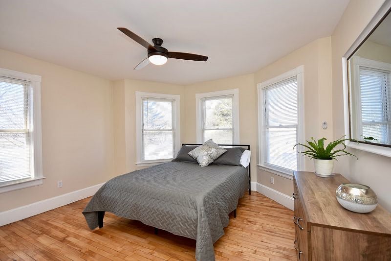 Bedroom with bay window, queen bed, 43" Smart TV,  Payson Park and Back Cove View