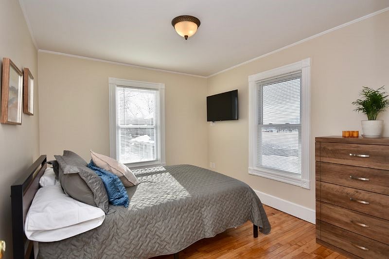 Bedroom with queen bed and 43" Smart TV, Payson Park and Back Cove View