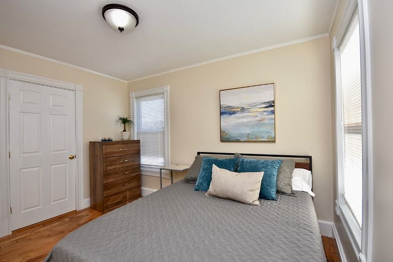 Bedroom with queen bed and 43" Smart TV