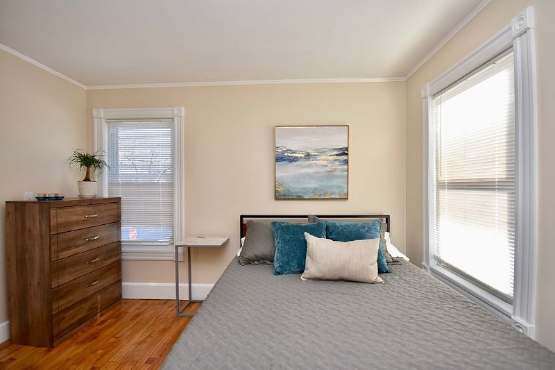 Bedroom with queen bed and 43" Smart TV