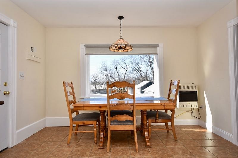 Kitchen with large table overlooking the Payson Park and the Back Cove