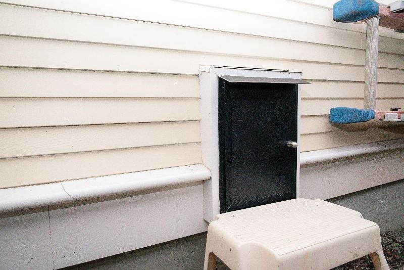 Custom Pet Door at Entrance Landing--fully closable from both interior and exterior.