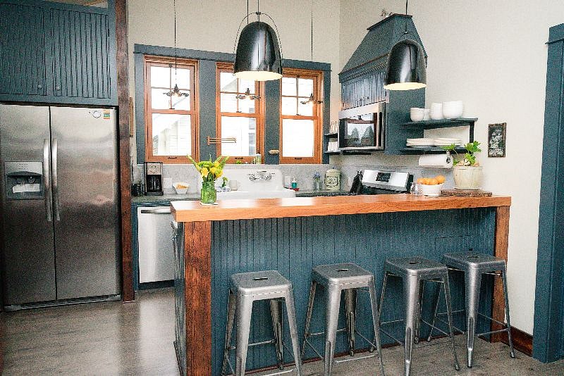 Full-size armoire fridge with water and ice dispenser does away with juggling ice trays.