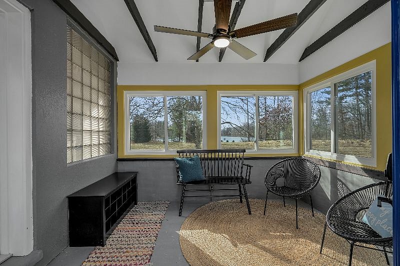 Entry Foyer and 3-season sunroom with seating, space for shoes and coat rack