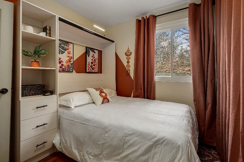 Office by day, this convertible space provides full-size cozy sleeping with black-out curtains and dedicated heating/cooling
