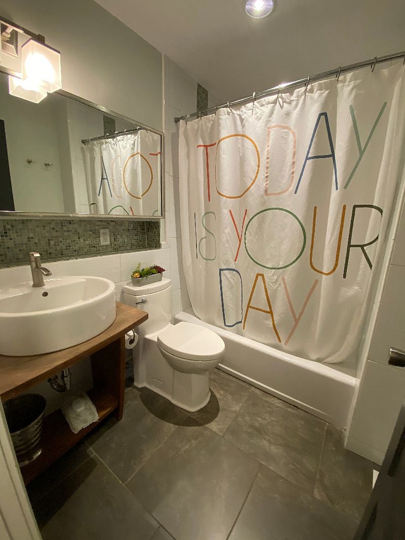 Hall bathroom with custom tile insert shelf