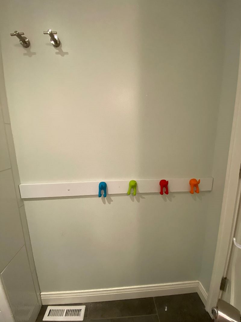 Hall bath - hooks behind door