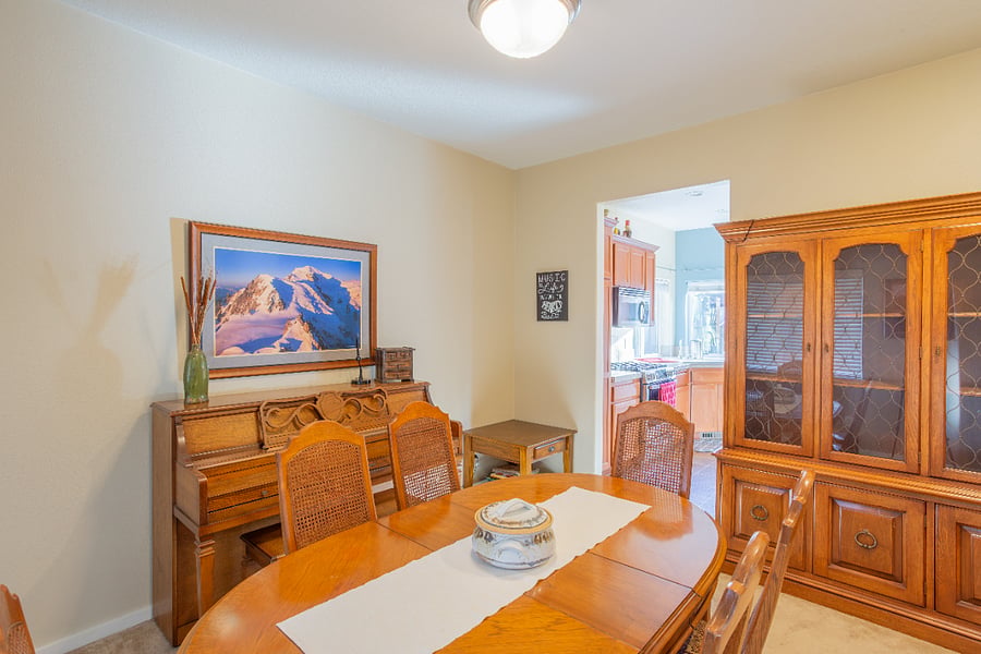 dining room with upright piano