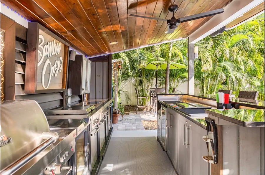 Outdoor kitchen, bar, resort style saltwater pool and jacuzzi  shared with home. Relax and enjoy!
