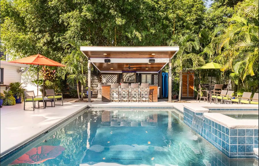 Outdoor kitchen, bar, resort style saltwater pool and jacuzzi  shared with home. Relax and enjoy!
