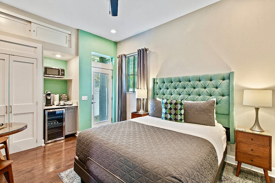 Large bedroom with private entrance and huge walk-in shower and bathroom in the room. Beverage center, closet, king size bed. Designer furnished. Short cut to the pool.