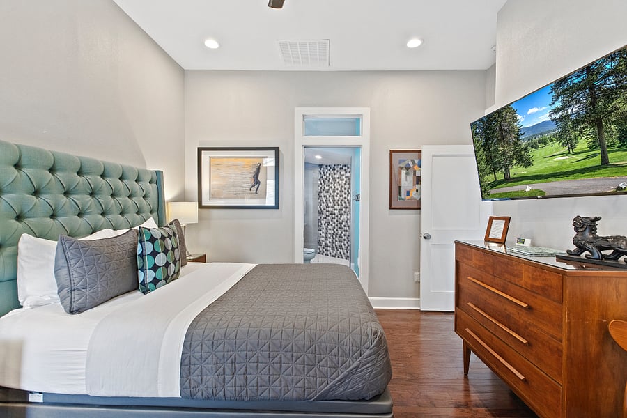 Large bedroom with private entrance and huge walk-in shower and bathroom in the room. Beverage center, closet, king size bed. Designer furnished. Short cut to the pool.
