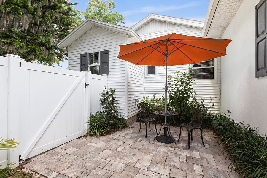 Private patio. Large bedroom with private entrance and huge walk-in shower and bathroom in the room. Beverage center, closet, king size bed. Designer furnished. Short cut to the pool.
