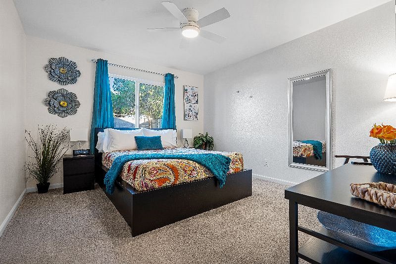 Second bedroom with queen bed and walk in closet