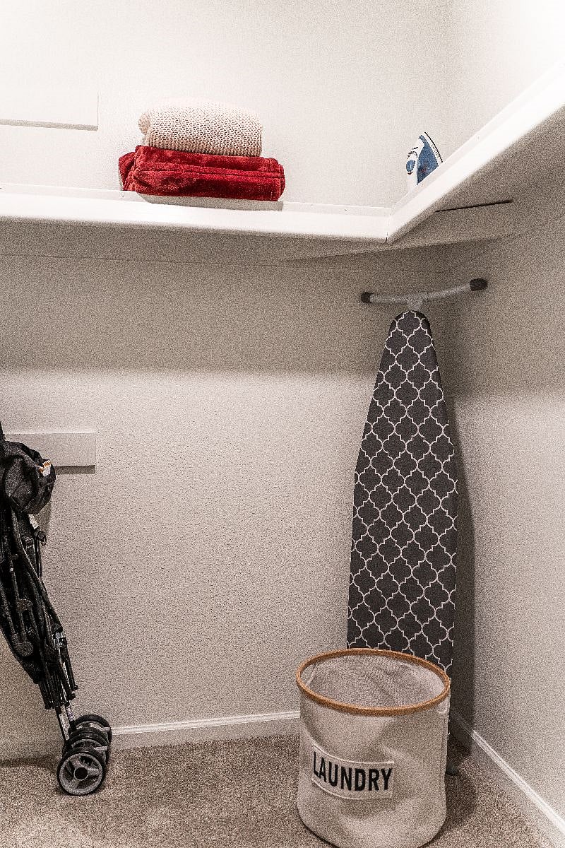 Primary bedroom walk in closet where you'll find many amenities