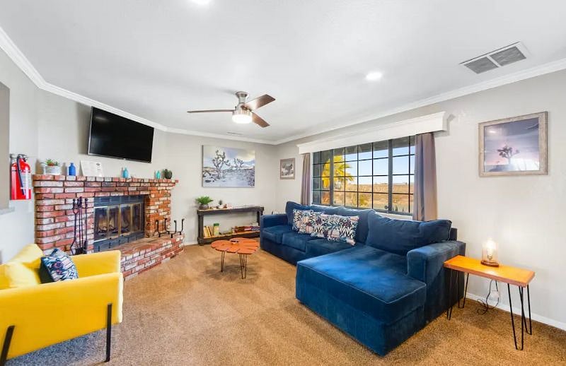 Living room with Roku TV and fireplace