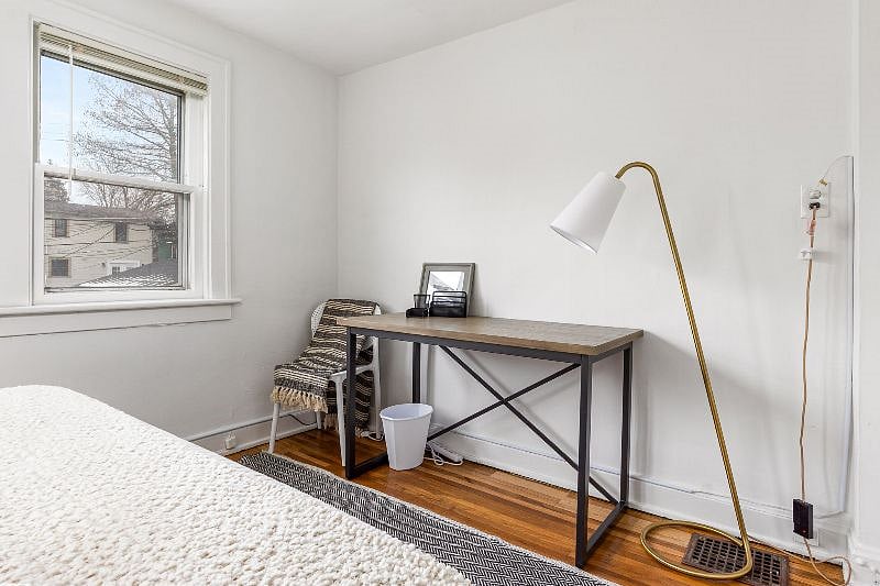 Bedroom 3 with designated work space and closet