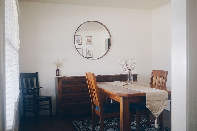 Dining room with large window over looking the front yard